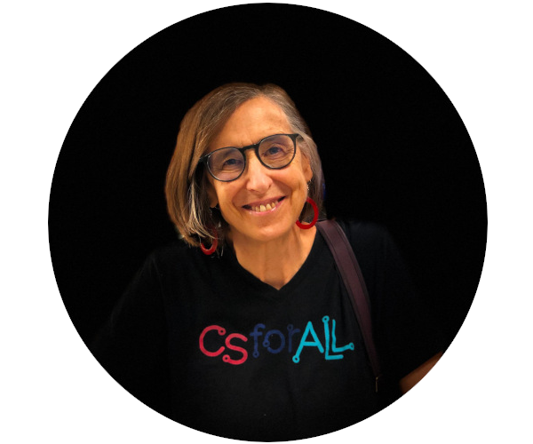 Head shot of L. Dillon. She is light-skinned, has chin-length straight brown hair, and is wearing glasses, red earrings, and a black T-shirt with a colorful 'CSforAll' logo.
